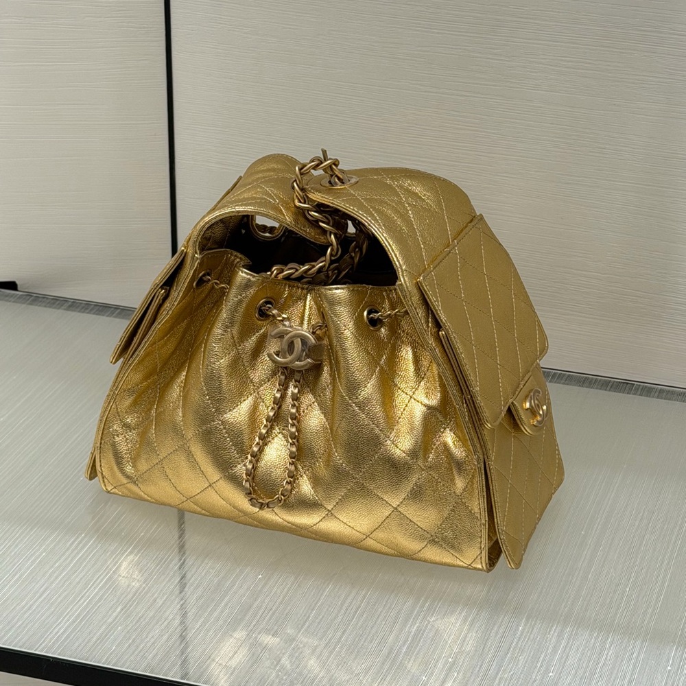 CHANEL 25 small Metallic Gold Quilted Drawstring Shoulder Bag